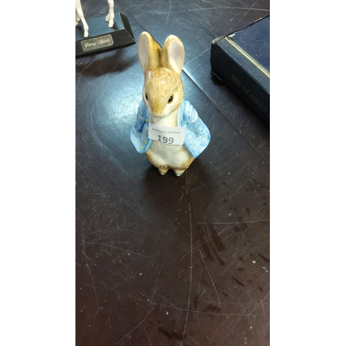 199 - 1996 Enesco Peter Rabbit figurine. Hand-painted porcelain, charmingly detailed.