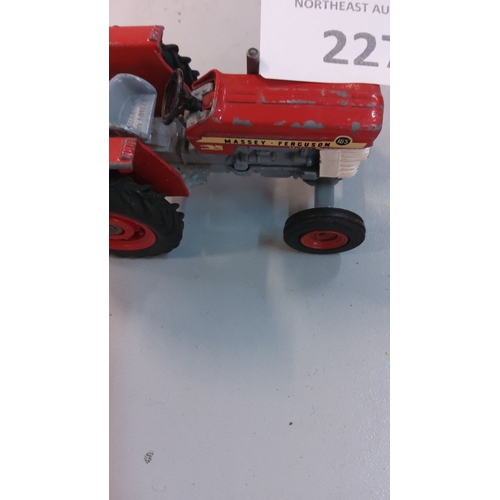 227 - Vintage Massey Ferguson 165 toy tractor, die-cast metal with authentic detailing.