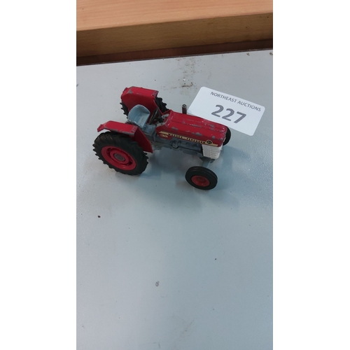 227 - Vintage Massey Ferguson 165 toy tractor, die-cast metal with authentic detailing.