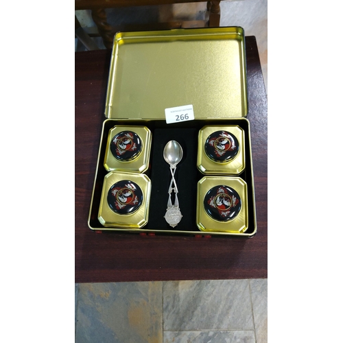 266 - Vintage lacquered tin tea set, featuring crane motifs. Includes four tins and decorative spoon.