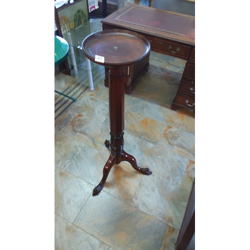 313 - Mahogany Georgian-style tripod pedestal table with circular top and claw feet.