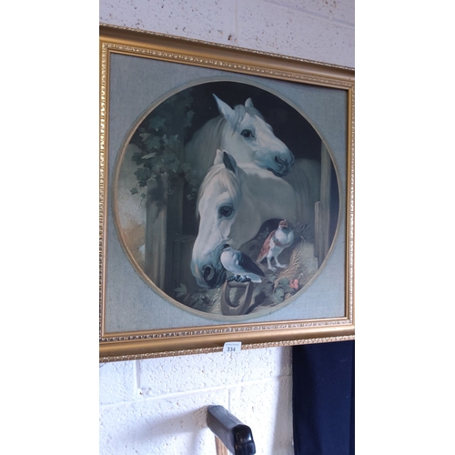 334 - Framed circular print featuring two white horses and birds, set in a rustic scene. Gold frame.