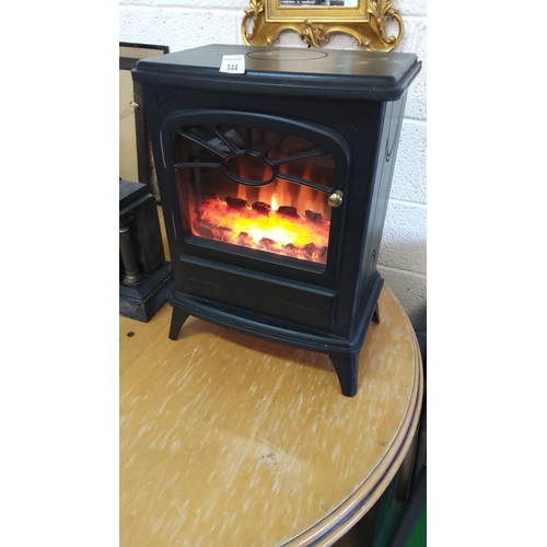 344 - Electric stove heater, black with realistic flame effect (pwo)