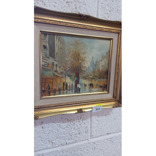 351 - Oil painting depicts a bustling Parisian street scene with autumn trees, in a gilt frame. It is sign... 