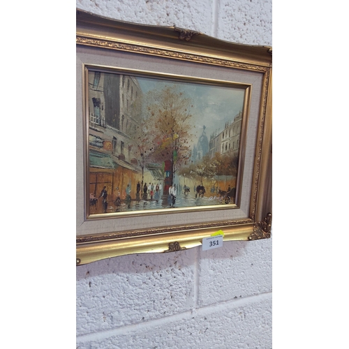 351 - Oil painting depicts a bustling Parisian street scene with autumn trees, in a gilt frame. It is sign... 