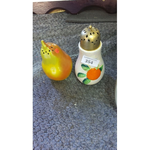 354 - Carlton Ware ceramic salt and pepper shakers feature fruit motifs with original stoppers, made in En... 