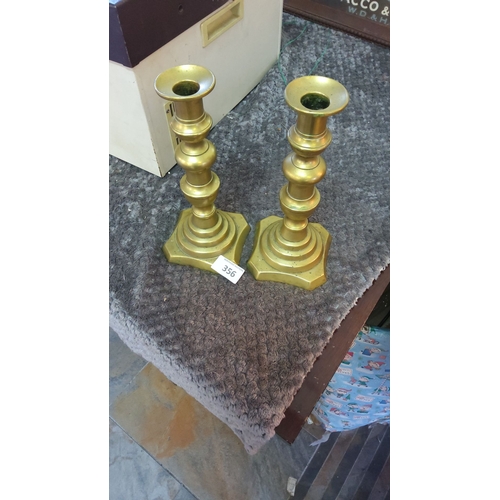 356 - Pair of vintage brass candlesticks with a stepped base design.