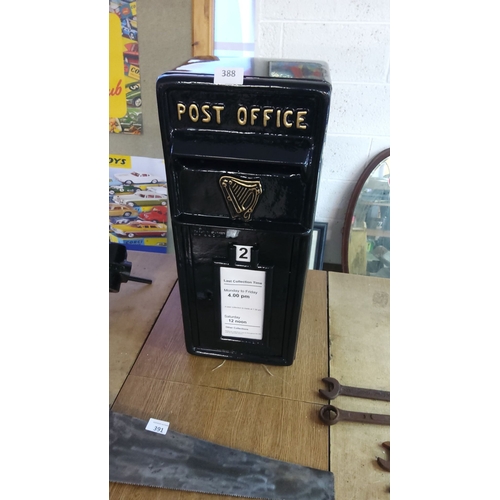 388 - Black cast iron front replica Irish Post Office box with gold lettering and harp emblem, from the mi... 