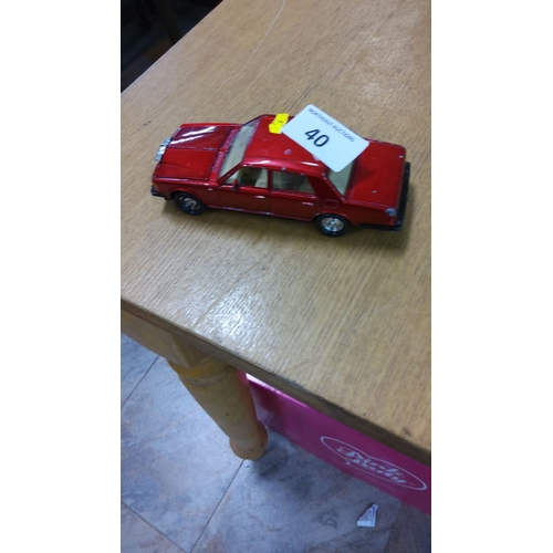 40 - Vintage Matchbox red die-cast Rolls Royce Silver Spirit model car, from the mid-20th century.