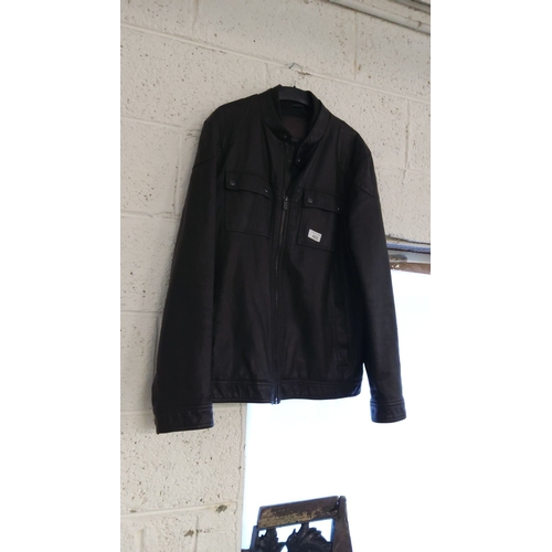 401 - Brown leather jacket by Crosshatch, size XL, with front zip and pocket details.