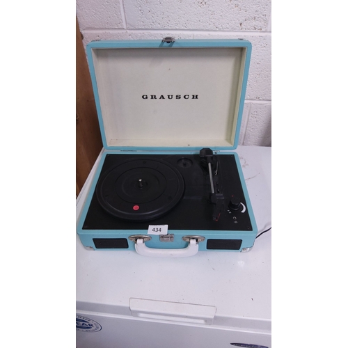 434 - Portable record player in retro-style suitcase design with turquoise finish, integrated speakers, an... 