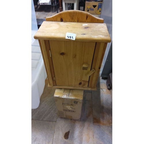 482 - Wooden cabinet with single door, made from pine. Features an arched top and natural finish.