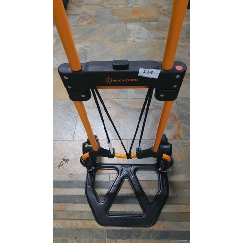 114 - Magnusson heavy-duty folding hand truck features a robust design with an ergonomic handle and a dura... 