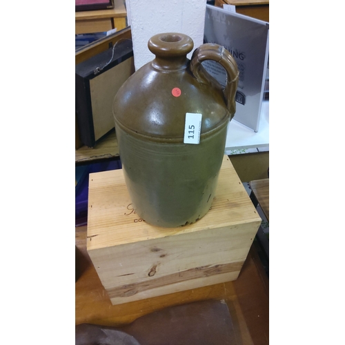 115 - Vintage stoneware jug with handle, from the early 20th century. Rustic brown glaze.