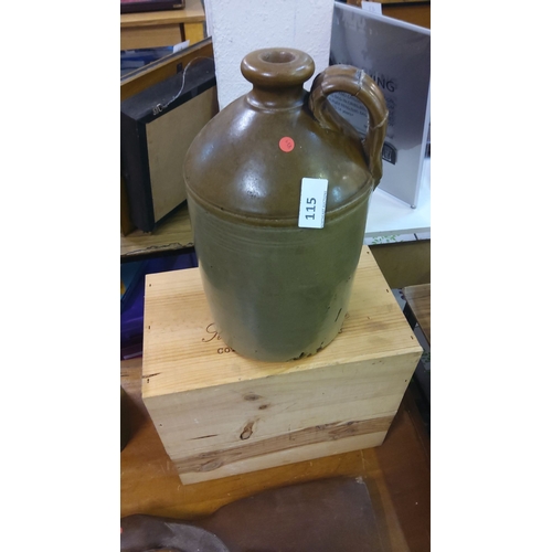 115 - Vintage stoneware jug with handle, from the early 20th century. Rustic brown glaze.