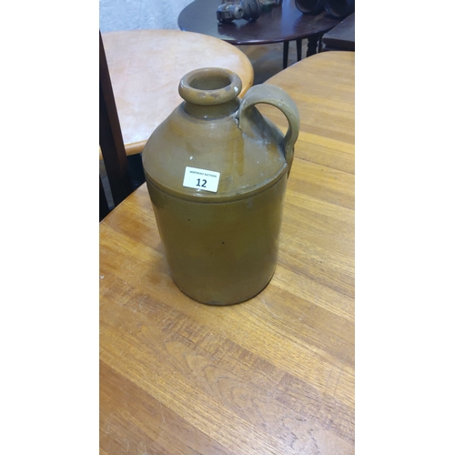 12 - 19th Century Stoneware Jug, classic glaze, with a sturdy handle.