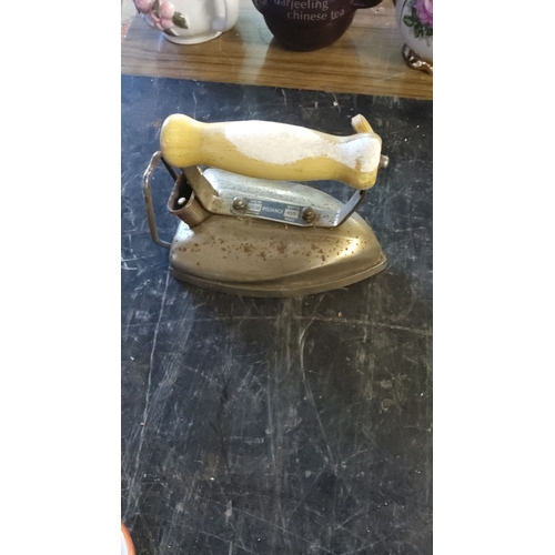 144 - Vintage Reliance Electric Iron, 450 Watts, British-made, metal body with a wooden handle.