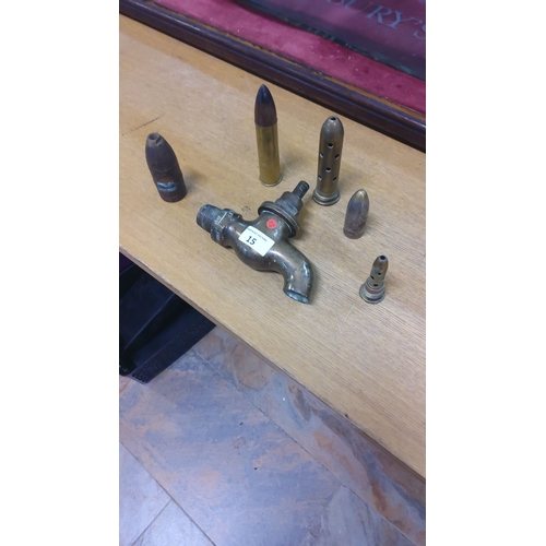 15 - Mixed lot featuring vintage brass faucet tap, various inert artillery shells, and bullet casings.