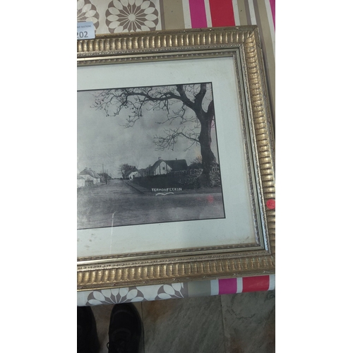 202 - Framed black-and-white village scene photograph, marked 