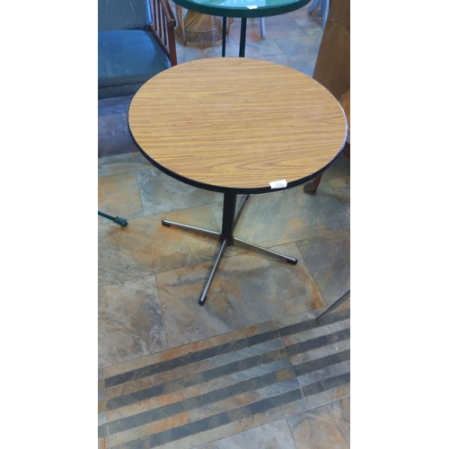 302 - Round side table with a wood veneer top and black edge, supported by a chrome and black metal tripod... 