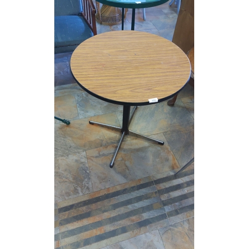 302 - Round side table with a wood veneer top and black edge, supported by a chrome and black metal tripod... 