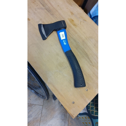 306 - Modern hand axe featuring an ergonomic rubber grip and a durable steel head. The item is in excellen... 