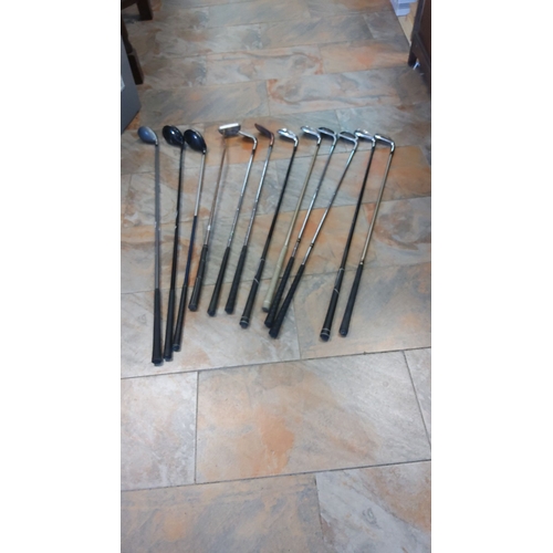 310 - Mixed collection of golf clubs, including drivers, irons, and putters. Steel shafts and original gri... 