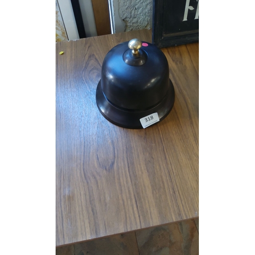 318 - Vintage brass and black cast hotel service bell, from the mid-20th century, features a sleek dome de... 