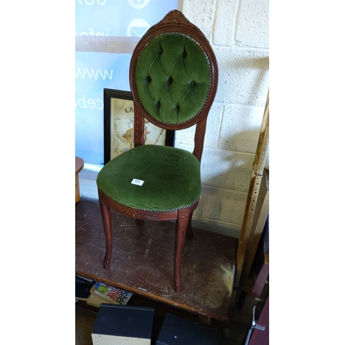 324 - Victorian-style mahogany chair, carved floral detailing, upholstered in deep green tufted velvet, el... 