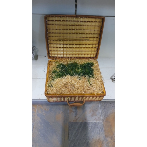 33 - Vintage woven picnic hamper with lid and handle, featuring a classic natural straw and wicker design... 