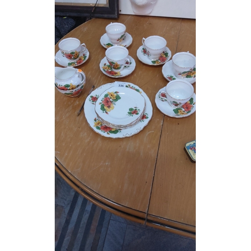 336 - Colclough bone china tea set, mid-20th century, England. Features vibrant floral design with gilded ... 