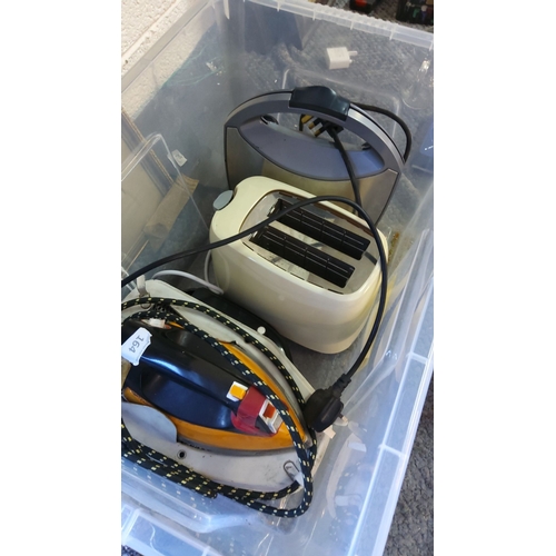 342 - Mixed lot of small household appliances, including a toaster, an iron, and a sandwich toaster. Condi... 