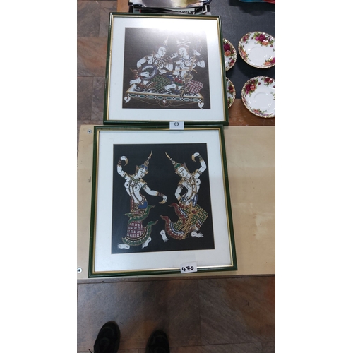 470 - Pair of framed traditional Thai artworks, intricately detailed, featuring mythological figures on bl... 