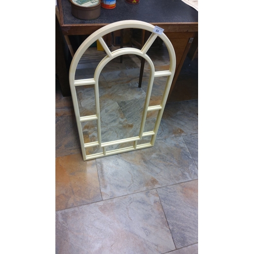 84 - Arched bone-painted mirror with geometric muntin-style frame. Excellent condition.