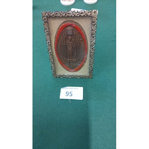 95 - Antique-style metal frame houses a red-bordered religious medallion with intricate detailing, from t... 