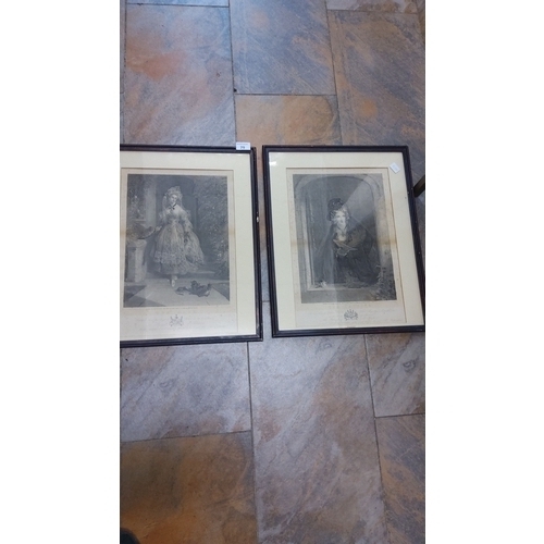 79 - Pair of 19th-century framed prints depicting elegant figures with fine detailing and ornate presenta... 