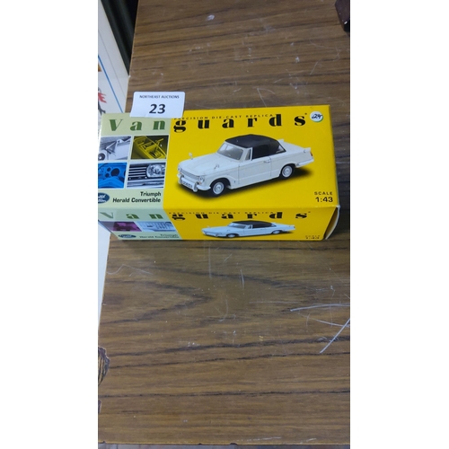 23 - Vanguards 1:43 Triumph Herald Convertible die-cast model, VA07401. Pristine boxed condition, white f... 