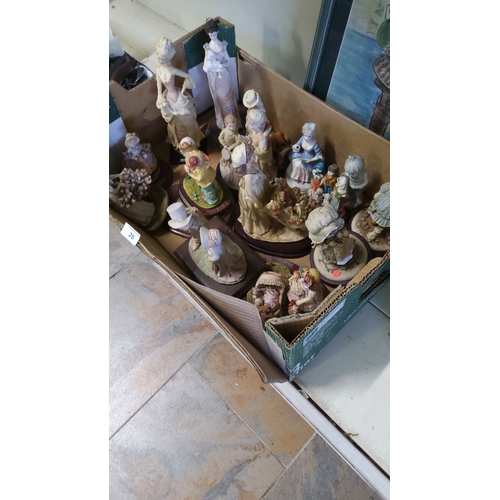 26 - Mixed lot of vintage porcelain figurines, including Victorian-style ladies, children, and pastoral s... 