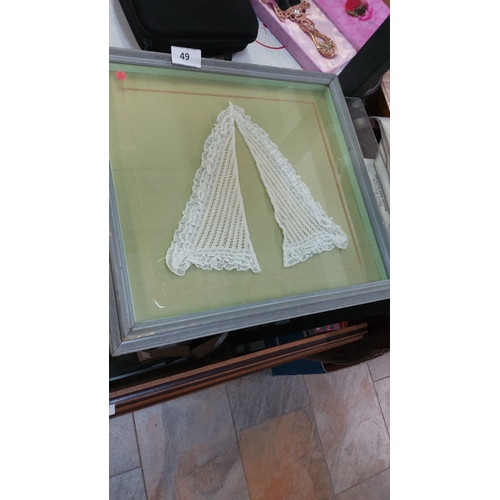 49 - Framed vintage Carrickmacross lace collar, displayed under glass with grey-tone frame.