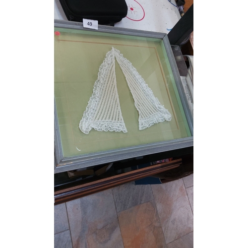 49 - Framed vintage Carrickmacross lace collar, displayed under glass with grey-tone frame.