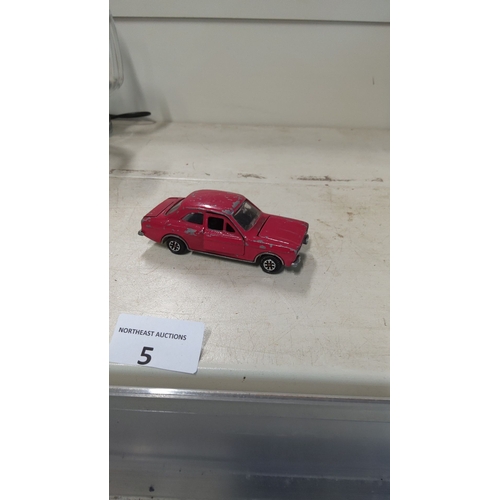 5 - Vintage Corgi Ford Escort Diecast Car, red finish, detailed undercarriage, 