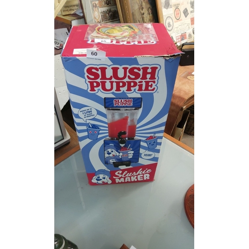 60 - Slush Puppie Slushie Maker, boxed. Iconic design, creates up to 1 liter of slush in minutes.