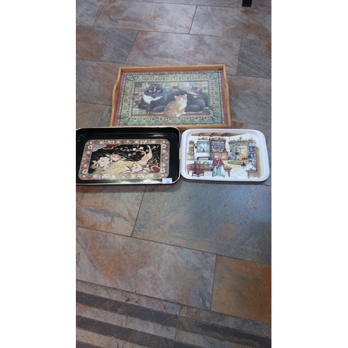 66 - Set of three decorative trays: a wooden cat motif tray, a floral Japanese-style tray, and a vintage ... 