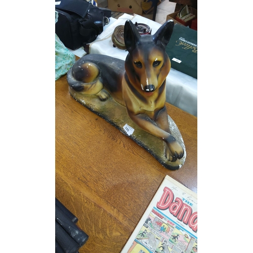 105 - Hand-painted ceramic German Shepherd figurine from the mid-20th century. Features realistic detailin... 