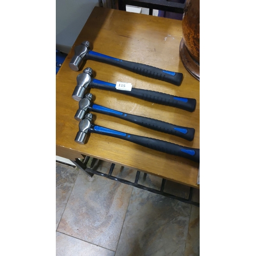 115 - Set of four modern machinist hammers. Durable steel heads with ergonomic rubberized grips. Excellent... 