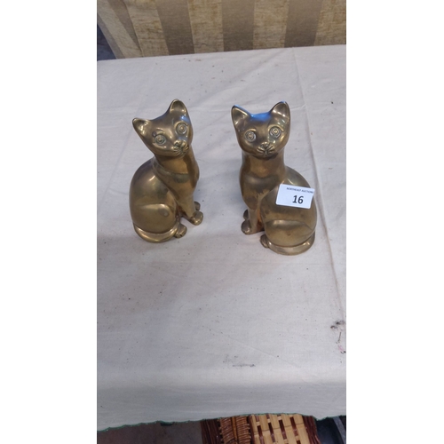 16 - Pair of vintage solid brass cat figurines, polished finish with charming expressive details.