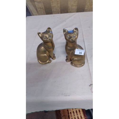 16 - Pair of vintage solid brass cat figurines, polished finish with charming expressive details.