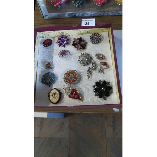 25 - Collection of vintage costume brooches, assorted materials and vibrant designs, including rhinestone... 