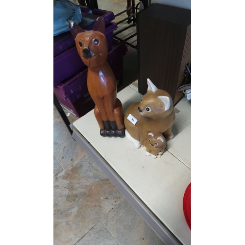 31 - 2 x Hand-carved wooden cat statues with painted details