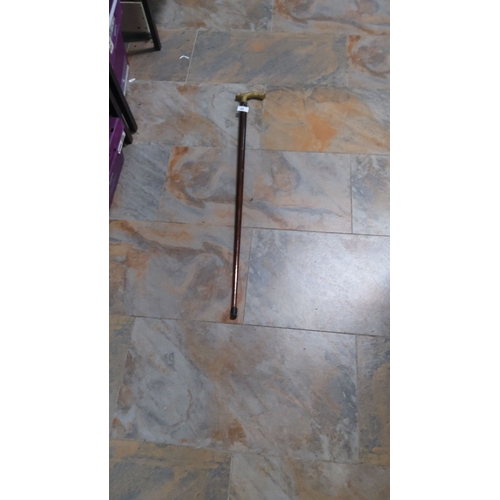 40 - Vintage wooden walking cane with brass T-handle, from the mid-20th century. Features sturdy construc... 